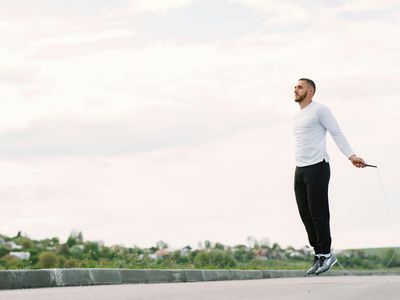 Blurred motion of jumping rope in dark room